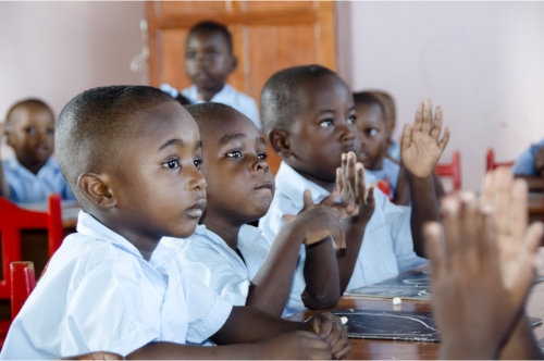 students listening to their teacher